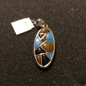 Blue/brown/silver charm.